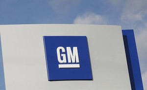 GM doubles Q1 net income; operating profit falls