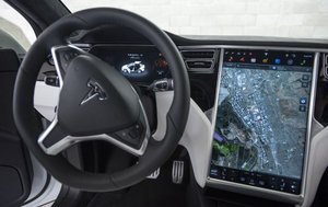 Musk makes self-driving technology Tesla's costly new calling