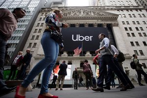 Uber slips below $70 billion value in turbulent first day