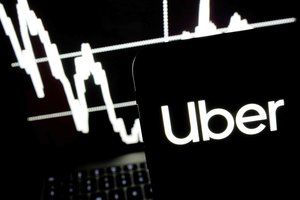 Uber drops in trading debut after shares open below IPO price